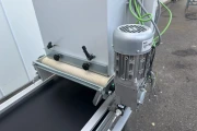 Visser VD-450 tray covering machine with roller conveyor