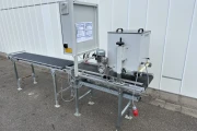 Visser VD450 tray covering machine with roller conveyor
